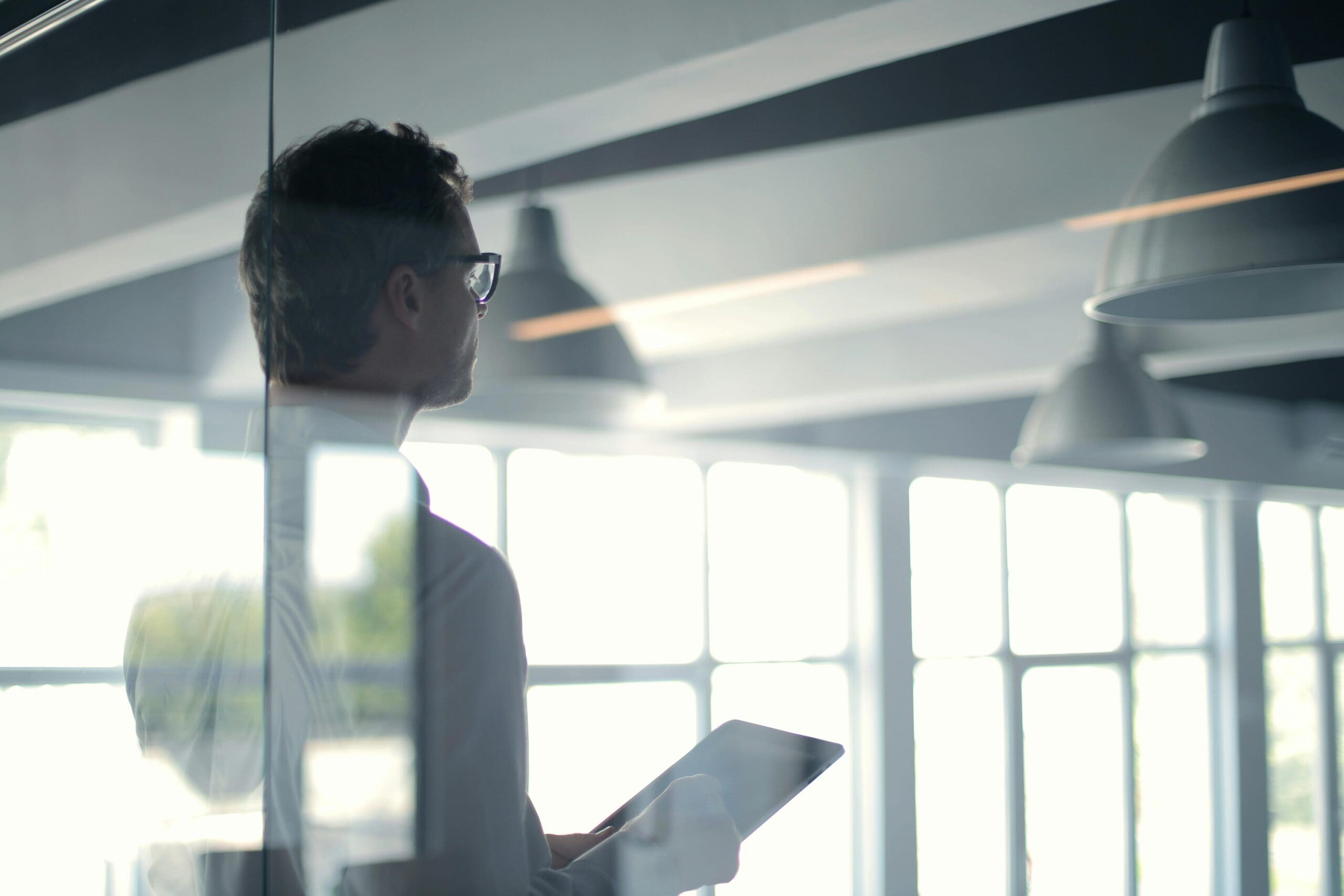 Executive Resume Guide - Man in Boardroom
