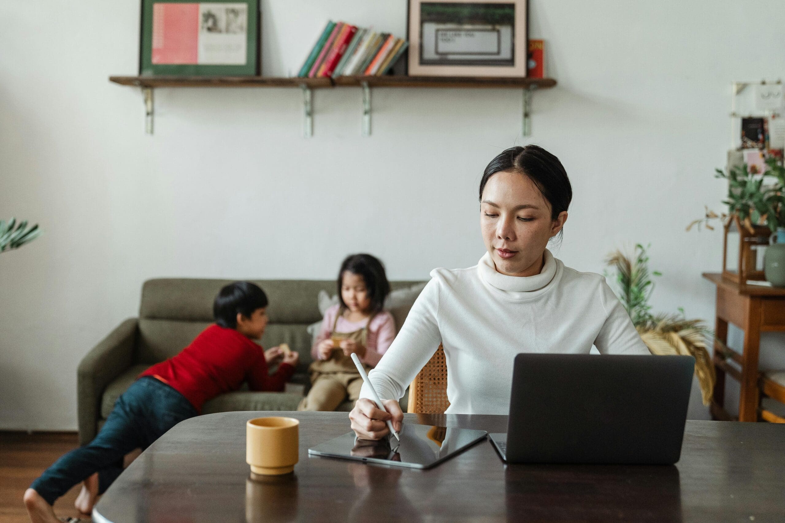 Woman updating her resume and reflecting on her career journey after a break